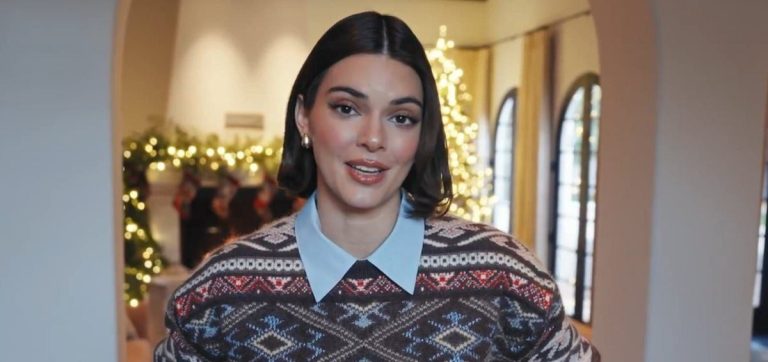 Kendall Jenner in her living room, surrounded by Christmas decorations