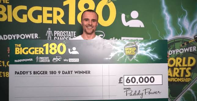 After Dutchman Christian Kist threw the first nine-darter of the World Darts Championship at Alexandra Palace, a fortunate fan won a random