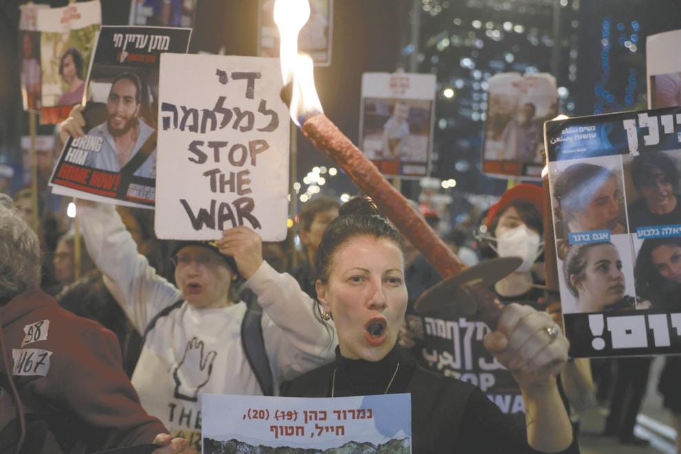 People take part in a rally calling for the return of hostages held in the Gaza Strip amid reports of a possible Gaza cease fire and hostage release deal being reached on Jan.15, 2025 in Tel Aviv, Israel. Image: Getty images