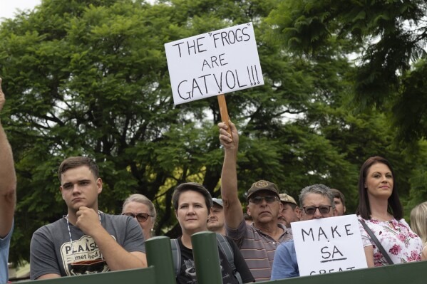 Afrikaners Supporting Trump Rally Outside US Embassy in PTA 1 Pro-Trump Afrikaners picket in support of an executive order by US President Donald Trump, granting Afrikaners refugee status in the US, outside the US Embassy in Pretoria. Image AP.