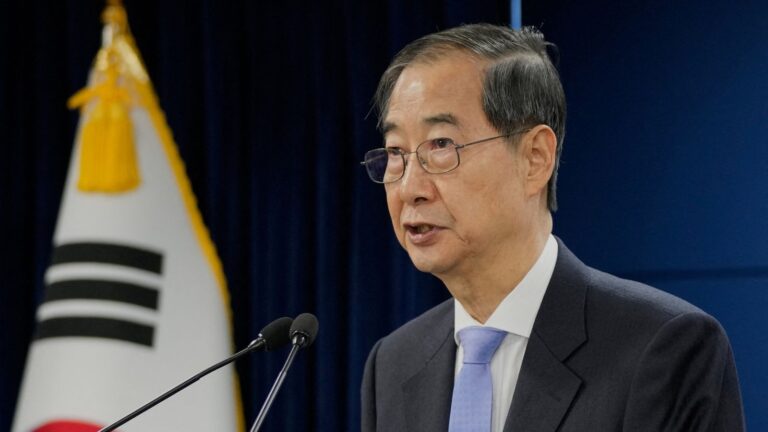 South Korean acting president Han Duck-soo speaking at a news conference earlier on Monday. Image credits: Sky News