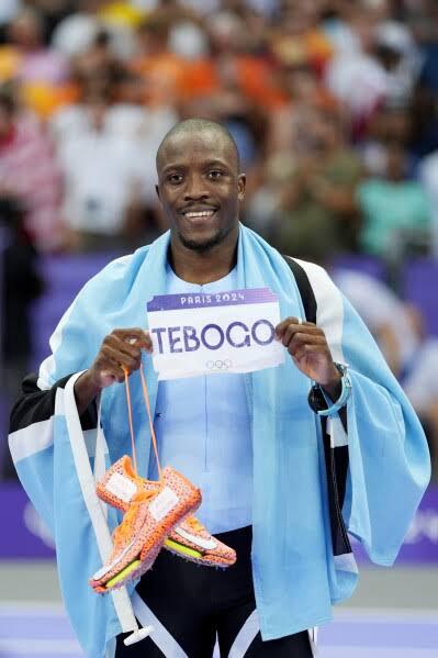 Botswana’s first Olympic gold medallist reflects on his journey and his role in shaping young athletes. Source image: apnews