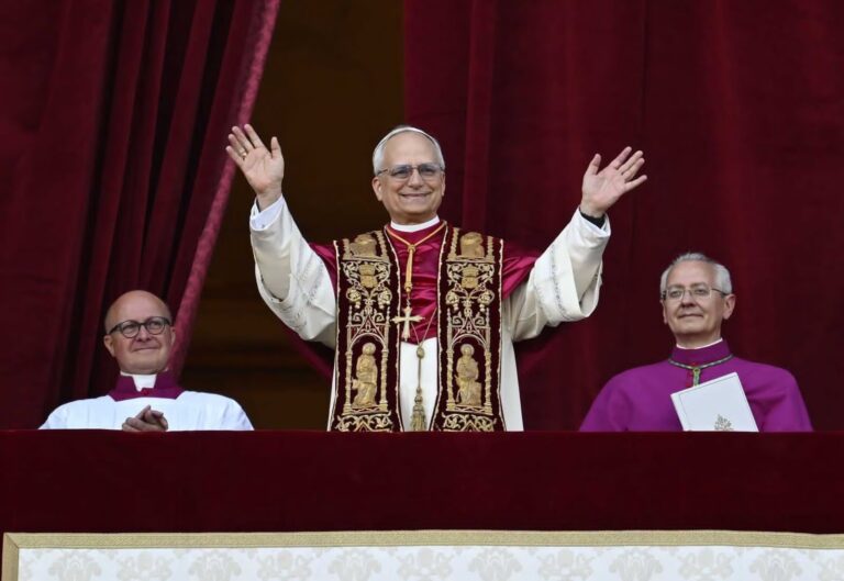 Pope Leo XIV, the former Cardinal Robert F. Prevost, waves to the crowds in St. Peter's Square at the Vatican after his election as pope May 8, 2025. The new pope was born in Chicago.