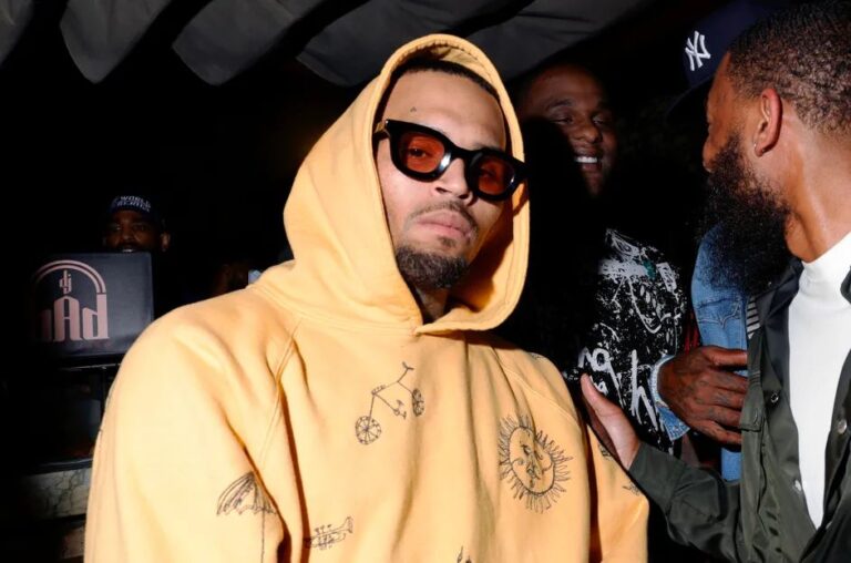 R&B star Chris Brown was arrested at a luxury Manchester hotel in connection with a 2023 nightclub bottle attack, following allegations by music producer Abraham Diaw. Brown remains in custody as investigations continue. Source image : Amy Sussman/Getty Images