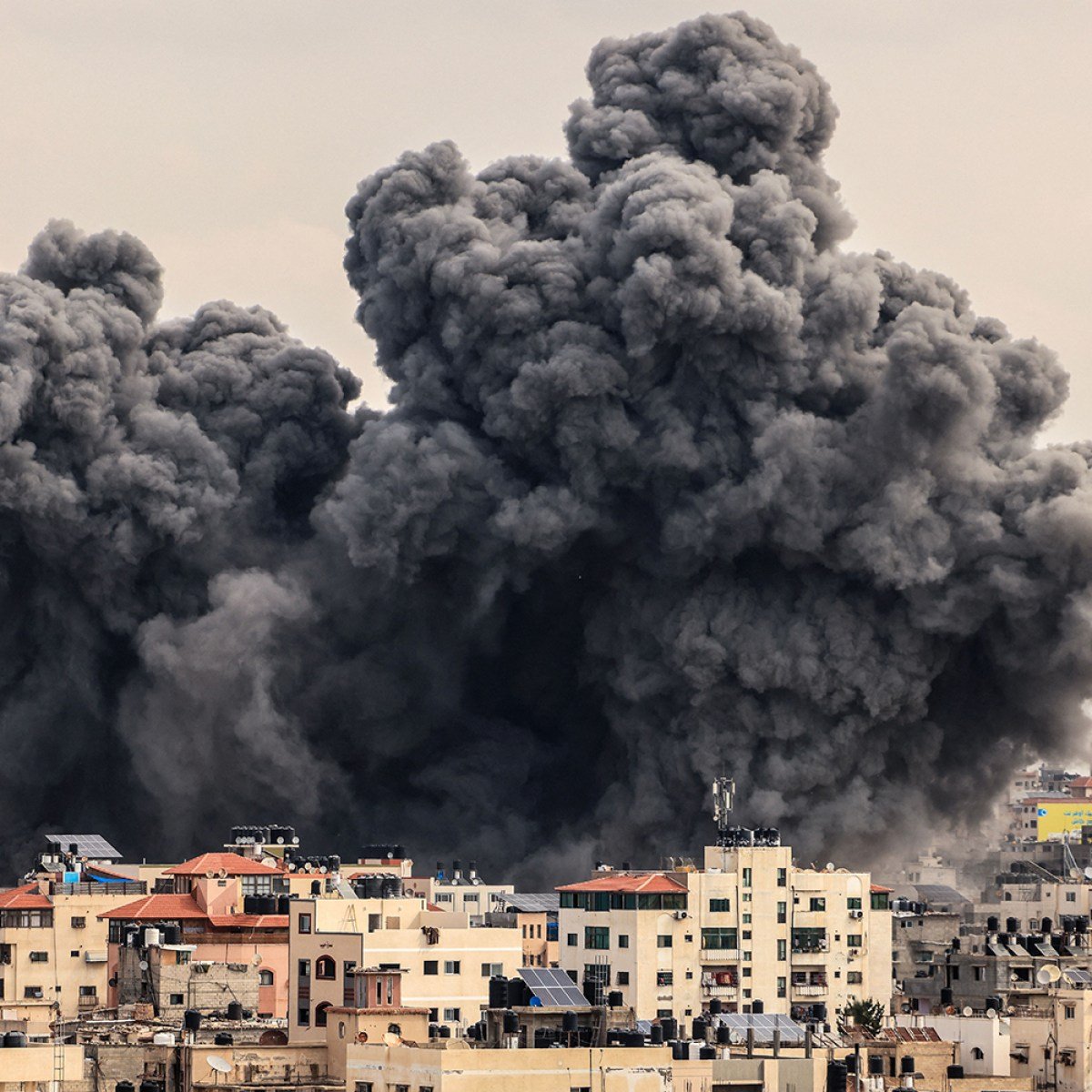 24 Palestinians Killed in Israeli Airstrike on Gaza Tent Settlement. Image: Mahmud Hams/AFP.