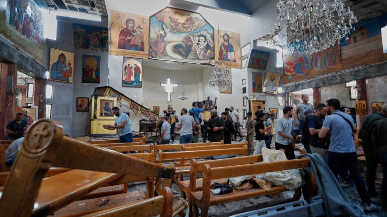 A suicide bomber detonated an explosive vest at a Greek Orthodox church in Syria on Sunday, killing 20 and wounding 52.