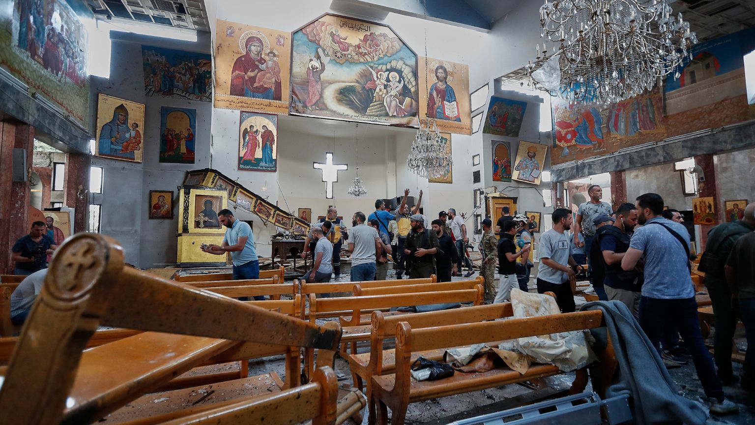 A suicide bomber detonated an explosive vest at a Greek Orthodox church in Syria on Sunday, killing 20 and wounding 52.