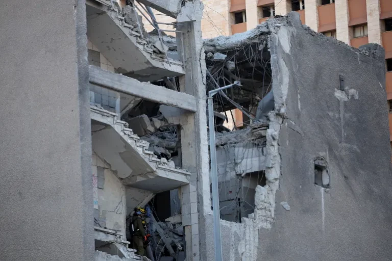 Iran strikes Israel city Haifa, injuring civilians. [Image by Florion Goga/Reuters]