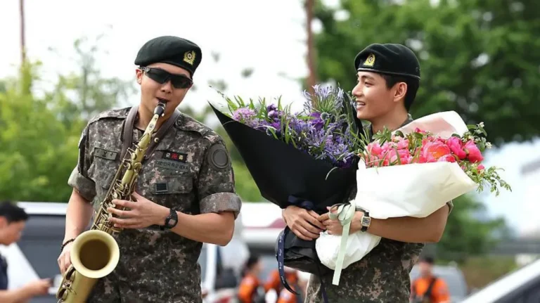 BTS leader RM serenades the crowd outside the South Korean military base in Chuncheon, Gangwon Province, as he and V are released from mandatory military service on June 10th. Image: AFP/Shin Yong-ju.