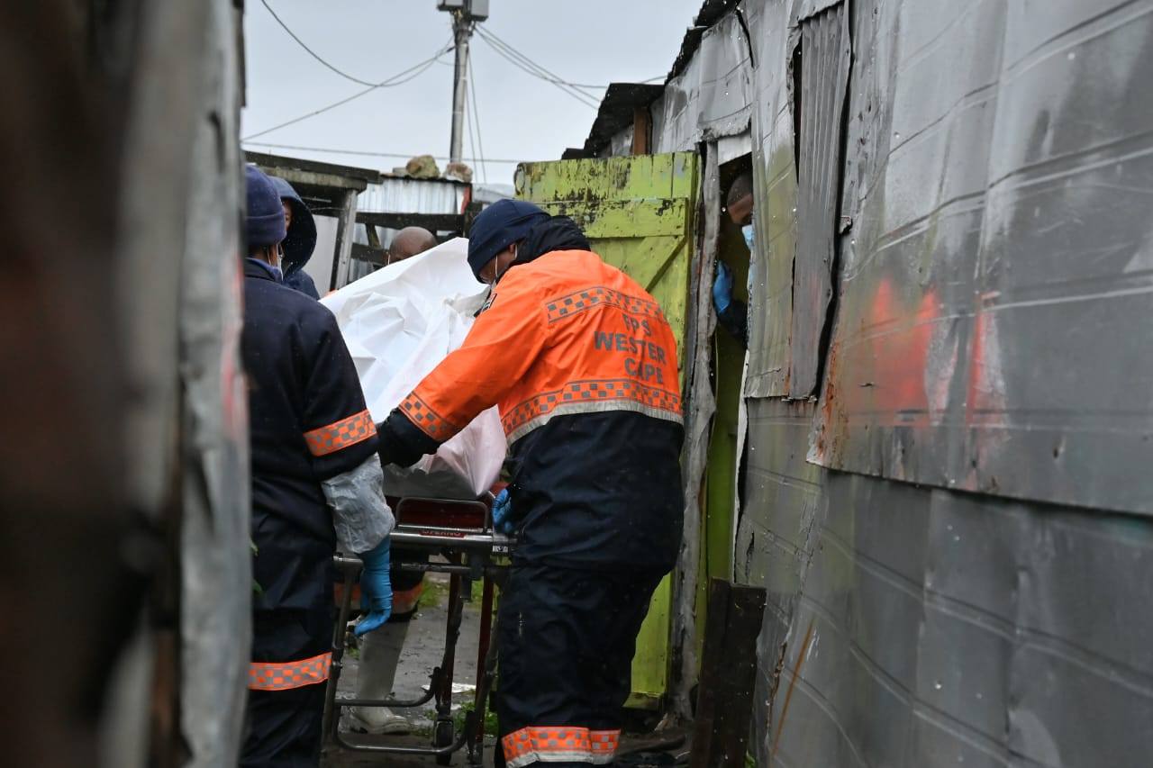 Police investigate the scene of a mass shooting in Gugulethu’s Kanana Informal Settlement, where seven men lost their lives in the early hours of the morning. Image: Ayanda Ndamane/Independent Newspapers