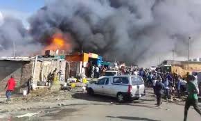 A fire broke out at an abandoned house in Albertina, east of Johannesburg, this morning | Image: The Guardian