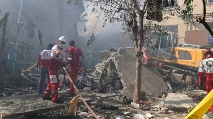Smoke rises over northeast Tehran after an Israeli airstrike hit the Shahid Chamran Nobonyad Complex, killing at least 60 people, including 20 children. image: AP Photo