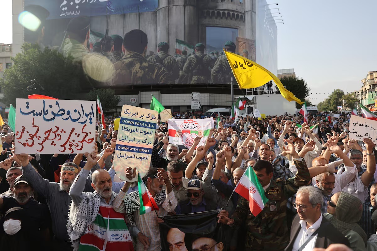 Iranians take to the streets in protests, condemning the U.S and Israel strikes on their nuclear sites and demanding resistance against foreign aggression. Image: Reuters
