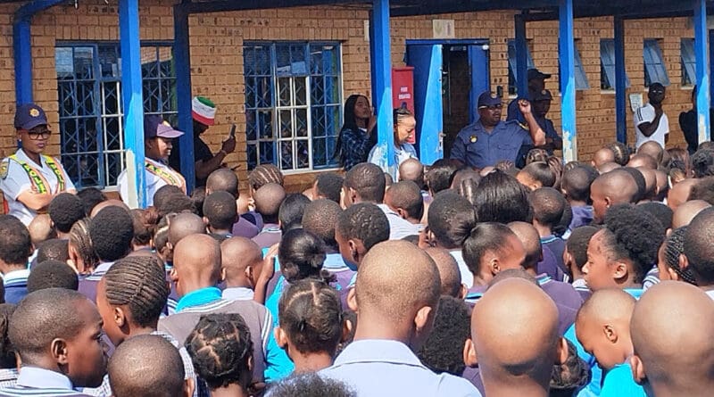 SAPS addressing students on a School Safety Awareness drive on 8 March 2023. [Orange Farm News]