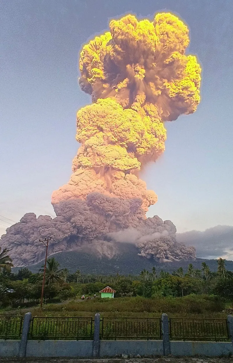 Mount Lewotobi Laki-Laki, one of Indonesia’s most active volcanoes, erupts on Tuesday evening, sending an ash plume over 11 kilometres high into the sky, prompting authorities to raise the volcanic alert to its highest level near Flores Island. Image: EPA.