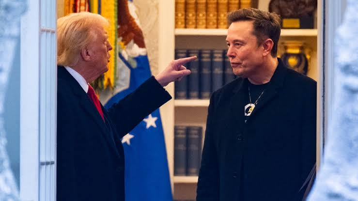 U.S. President Donald and entrepreneur Elon Musk during a [tense] exchange inside what appears to be the Oval Office.