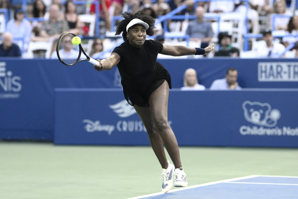 Venus Williams celebrates her comeback win at the DC Open after nearly two years off the court. Image: Nick Wass/AP.
