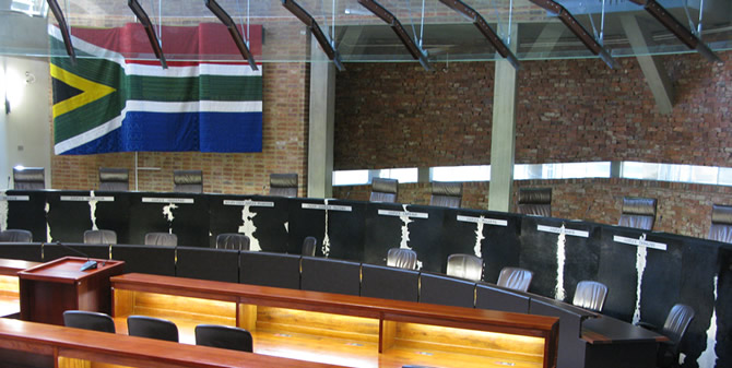 Former President Jacob Zuma’s legal team argues before the Constitutional Court, challenging President Cyril Ramaphosa’s decision to sideline Police Minister Senzo Mchunu and appoint Firoz Cachalia—a case that could reshape how executive powers are contested in South Africa. Image: ConCourt.