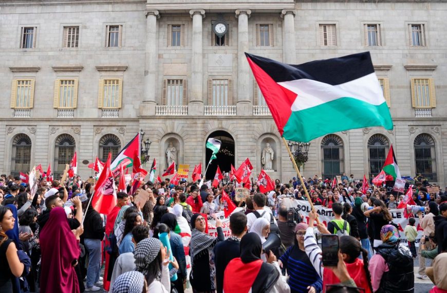 Barcelona, Spain, wave Palestinian flags and rally as part of the worldwide Gaza War protests, calling for action against Israel and demanding an end to the conflict.