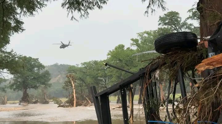 First responders search tirelessly for the missing in flood-ravaged Texas.