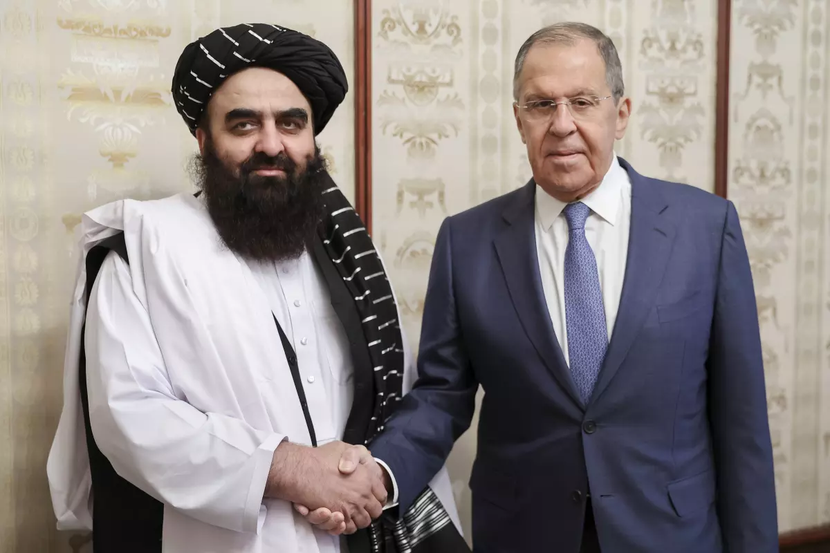 Russian Foreign Minister Sergey Lavrov shakes hands with Taliban Foreign Minister Amir Khan Muttaqi in Moscow, marking a historic moment as Russia becomes the first country to officially recognize the Taliban government. Image: Associated Press.