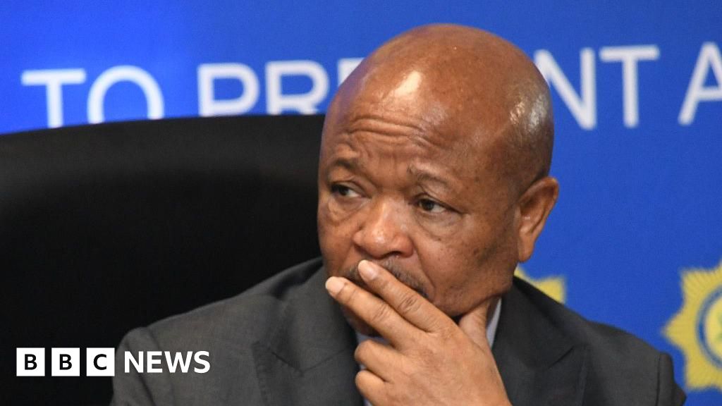Police Minister Senzo Mchunu has been placed on "leave of absence" by President Ramaphosa following explosive allegations, a decision that has sparked significant outcry from opposition parties and concerns among political analysts regarding public trust in law enforcement. Image: Getty Images/BBC News.