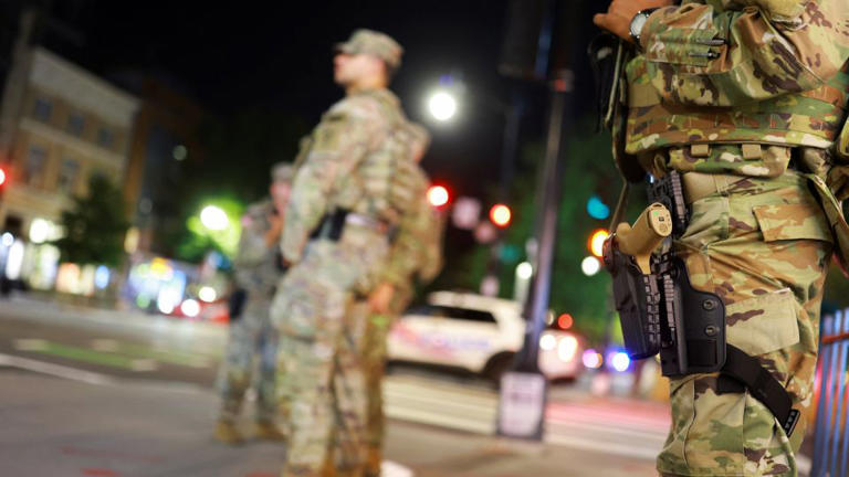 Armed Ohio National Guard troops patrol Logan Circle in Washington, D.C., under Trump’s crime crackdown initiative,
