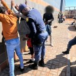 SAPS officers conduct a stop-and-search operation during high-density patrols under Operation Shanela 2 in the Northern Cape.