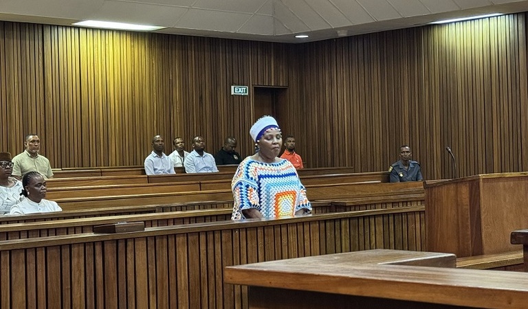 Mapisa-Nqakula corruption case: Nosiviwe Mapisa-Nqakula standing in Pretoria High Court during her trial, facing multiple corruption charges.