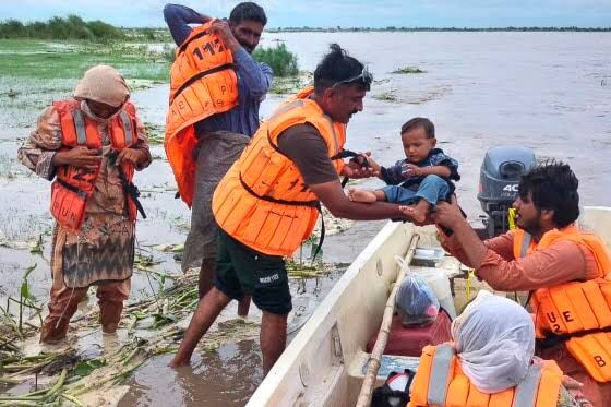 Residents are evacuated from flood-hit areas in Punjab province, Pakistan, after India released water from overflowing dams into low-lying border regions.