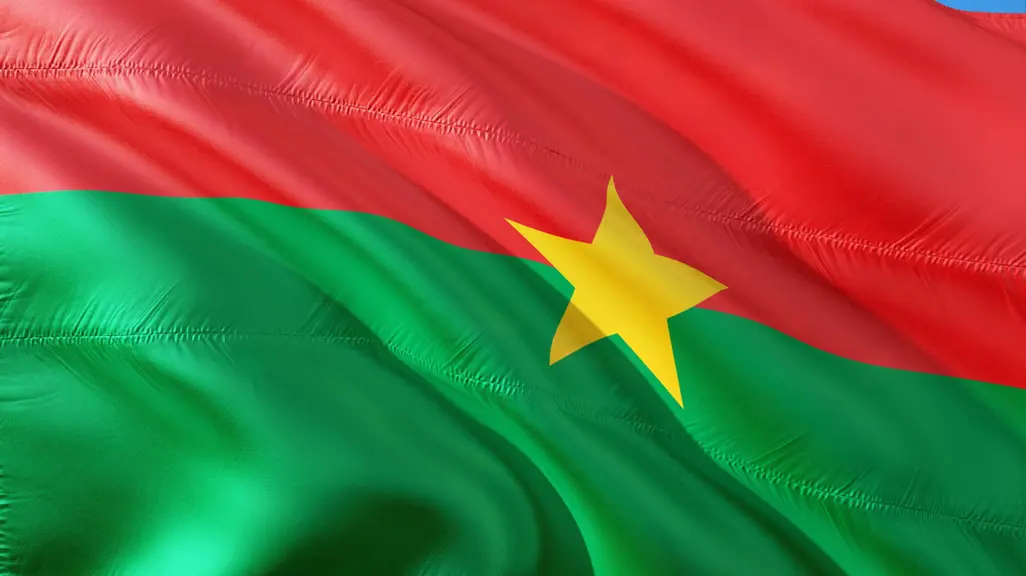 Picture: Pixabay.com Flag of Burkina Faso waving in the wind, showing red and green horizontal stripes with a yellow star in the centre.