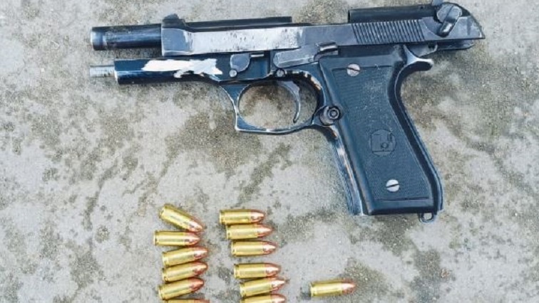 Police Service A black firearm with an aged, antique appearance.