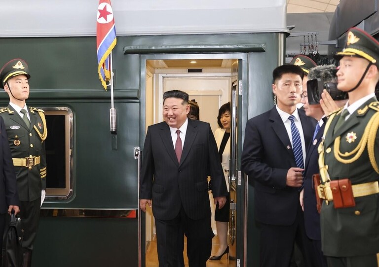 Kim Jong Un steps off his green armoured train in Beijing to attend the Victory Day military parade with Xi Jinping and Vladimir Putin