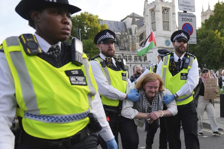 Police making arrests during London protest against the ban on Palestine Action