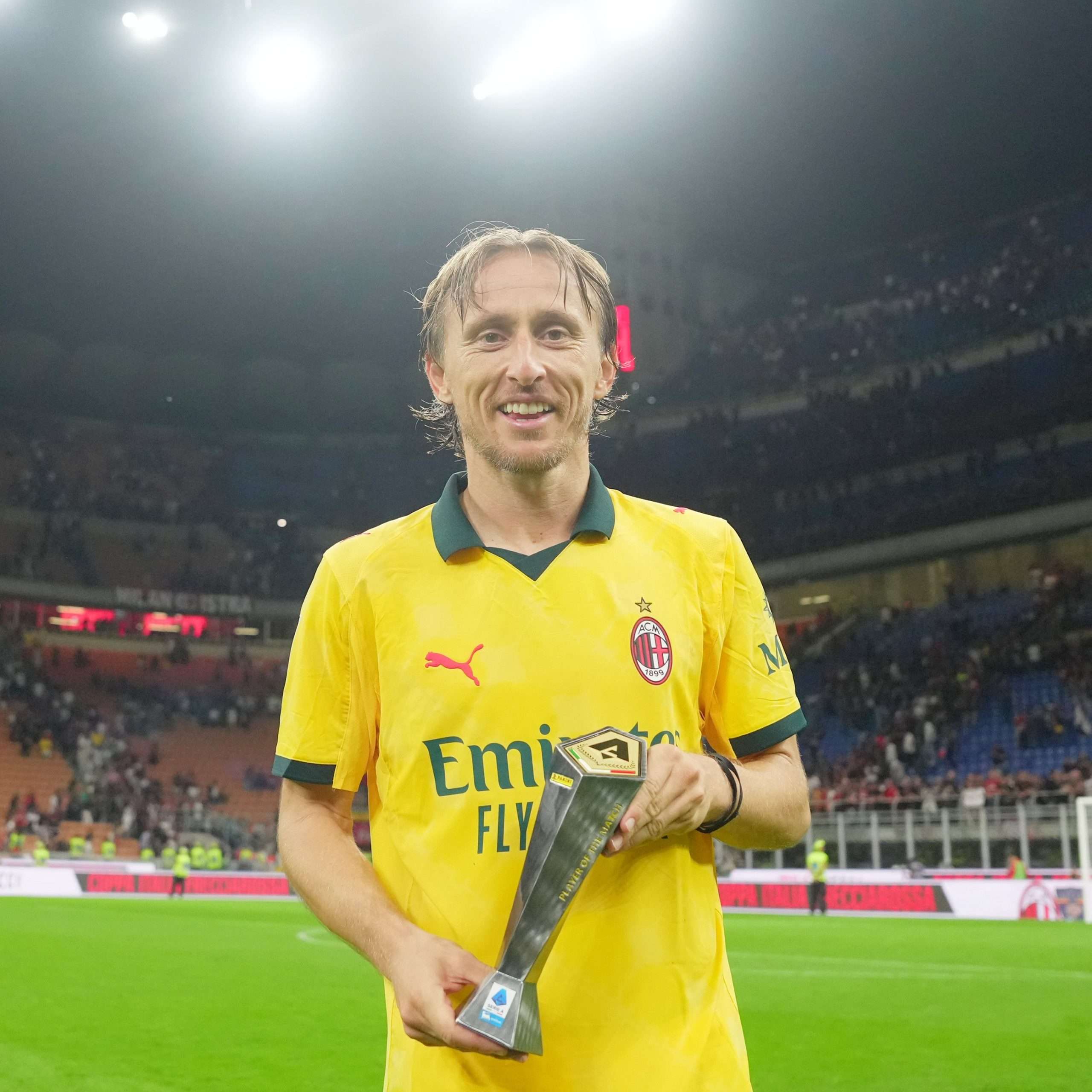Luka Modric receiving a Man of the Match Award.
