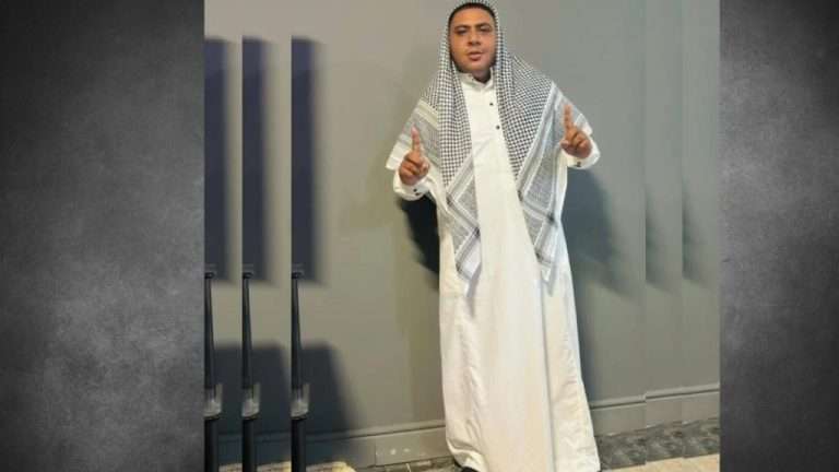 Mogamat Yusuf Daniels wearing traditional Islamic attire, standing and posing for a photo. He was killed in a tragic shooting during a phone sale arranged through Facebook Marketplace.
