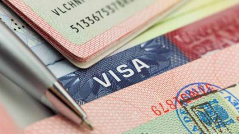 Image Credit: Gurdian Nigeria Close-up image of a Nigerian visa with a pen on top, symbolizing visa cancellations, with reference to Olufemi Soneye speaking on the U.S. Embassy canceling Nigerian visas.