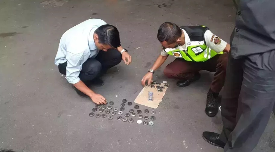 Metal fragments from tear gas canisters after a student-led unrest