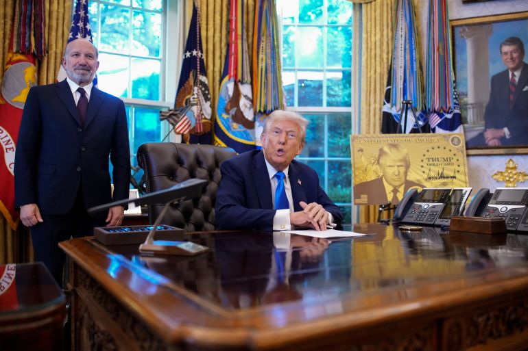 Donald Trump signs a proclamation on H-1B visa fees