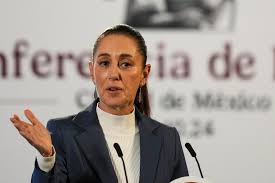 Claudia Sheinbaum speaking at Mexico's State of the Nation address, celebrating progress in U.S. relations and social programs