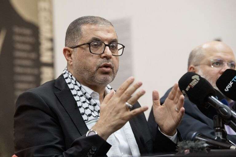 Hamas Senior official Bassem Naim warns Israel of putting hostages at risks