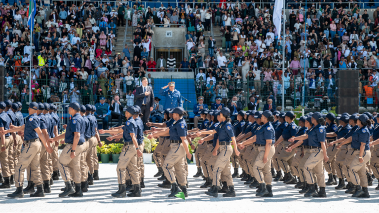 Cape Town Metro Police Graduates march in formation during a graduation parade attended by city officials and community members.