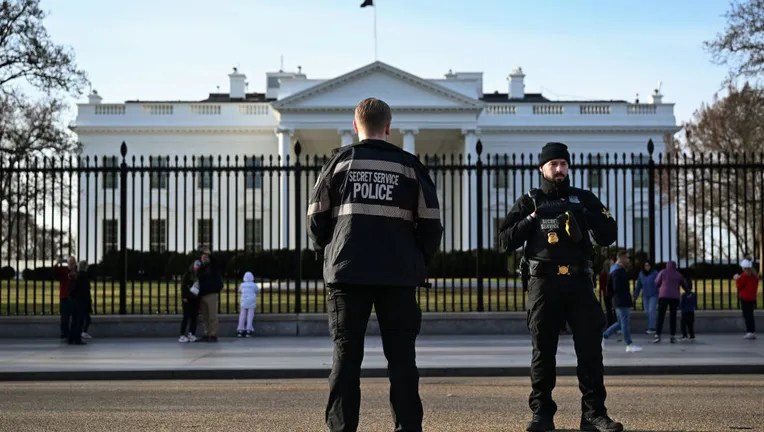 Secret Service officers defend the Trump Administration in the white house