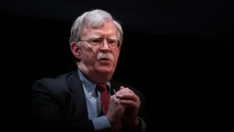 Trump admin targets, John Bolton Pleads not guilty