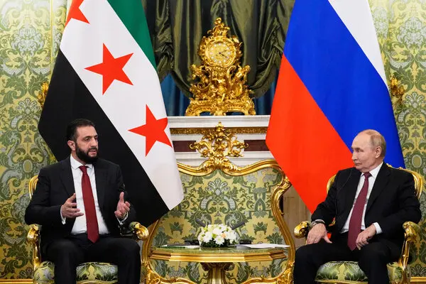 Syria President Ahmed al-Sharaa with Russian President Vladimir Putin in Moscow