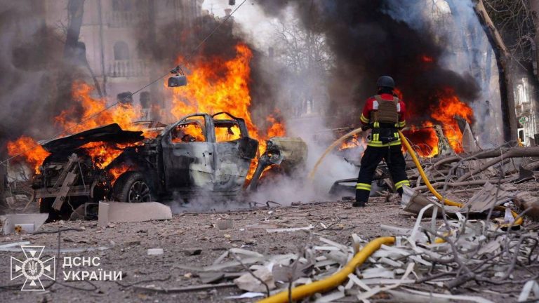 Ukrainian firefighters extinguish flames in Kyiv following overnight Russian attack
