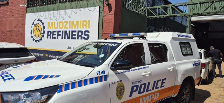 Police dismantle illegal gold refinery.