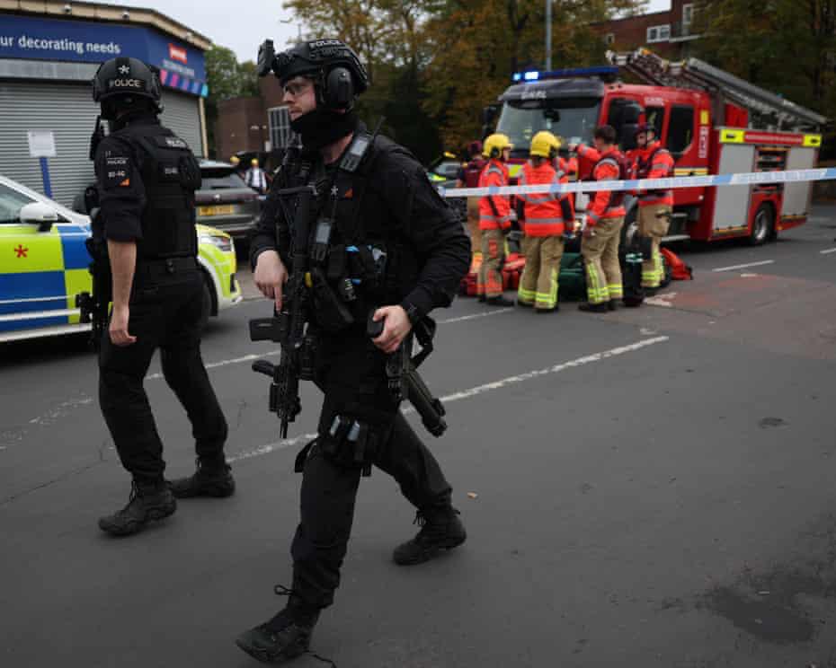Ambulances and emergency crews respond to the stabbing incident at a Manchester synagogue on Yom Kippur.