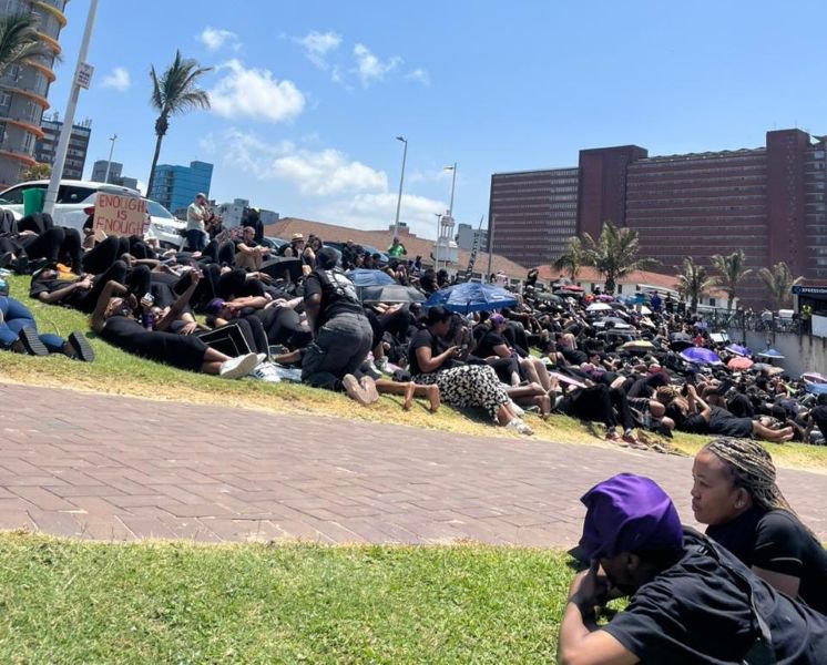 Thousands of women and men took a 15-minute stand in protest at lunchtime on Friday in memory of the women who are murdered every day. Photo by Tamasha Khanyi