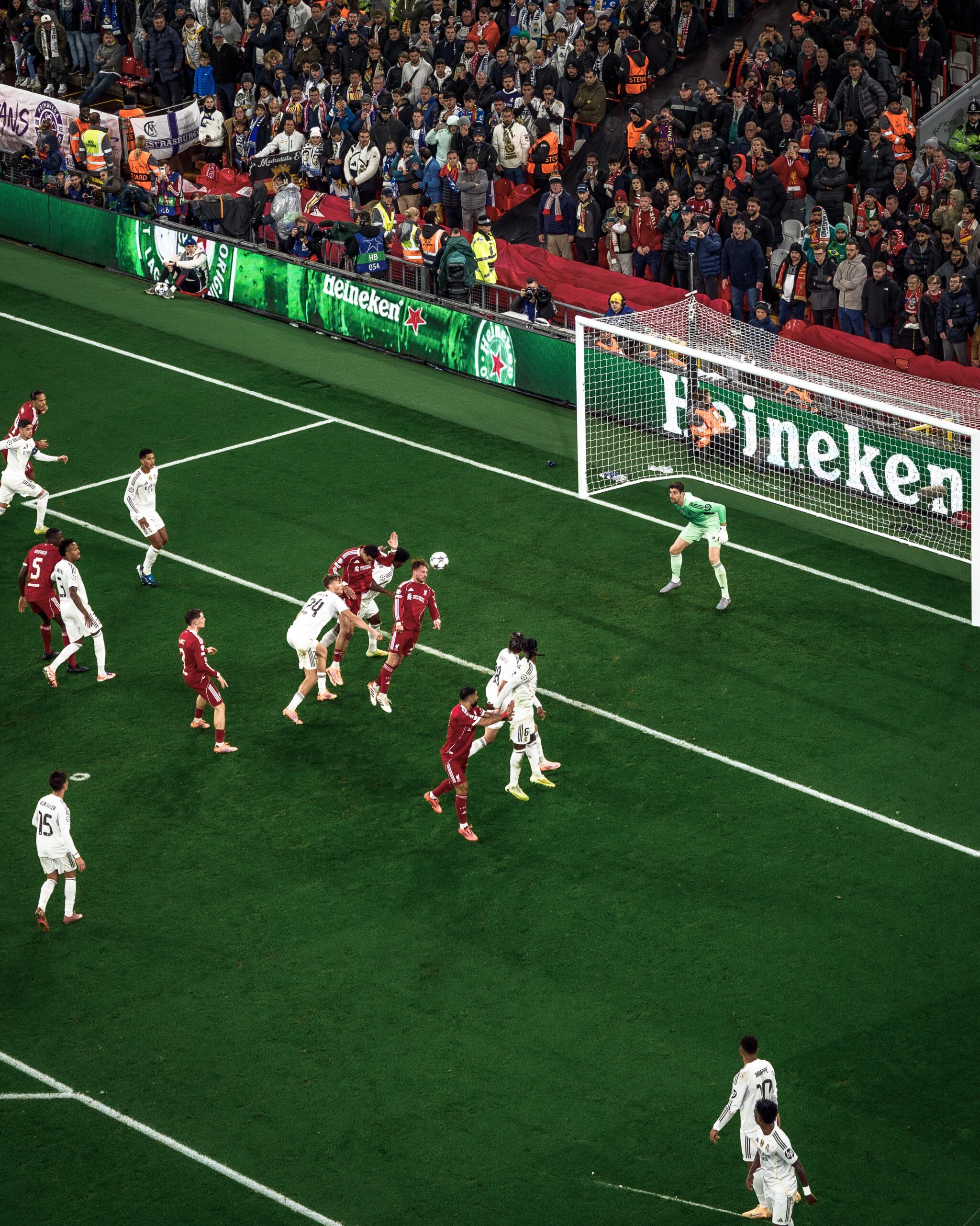 Liverpool Alexis Mac Allister heading in for a goal.